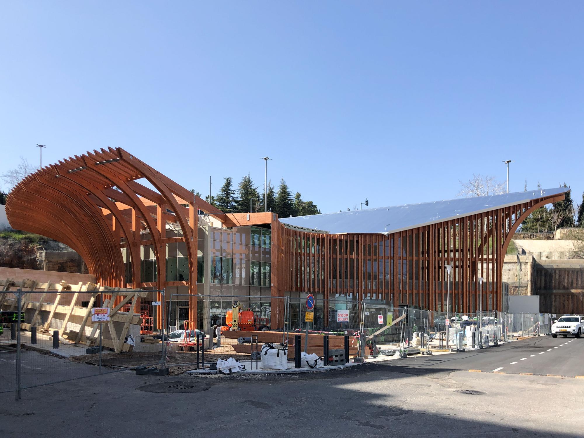 Timber façade and curved roof structure at Shaare Zedek Medical Center in Jerusalem