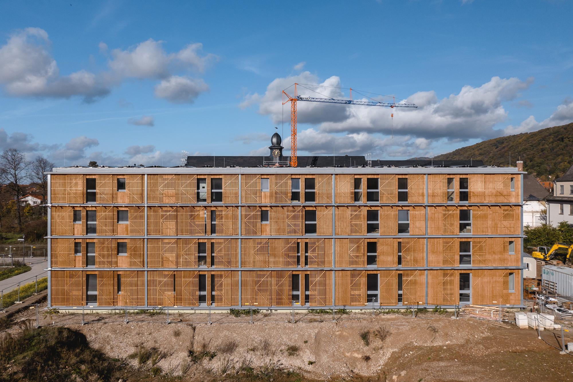 Completed timber façade of Collegium Academicum Heidelberg